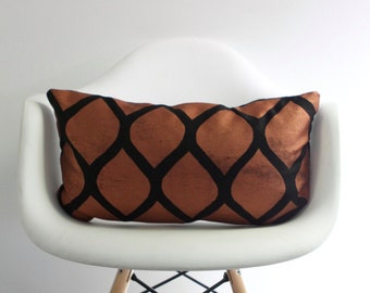 Aya 12x21 pillow cover hand printed in metallic copper on black organic hemp
