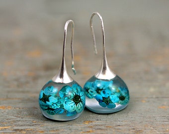 Real blossom earrings. Turquoise real flowers in resin spheres. Silver ox earwires. Big earrings. Gift for her.