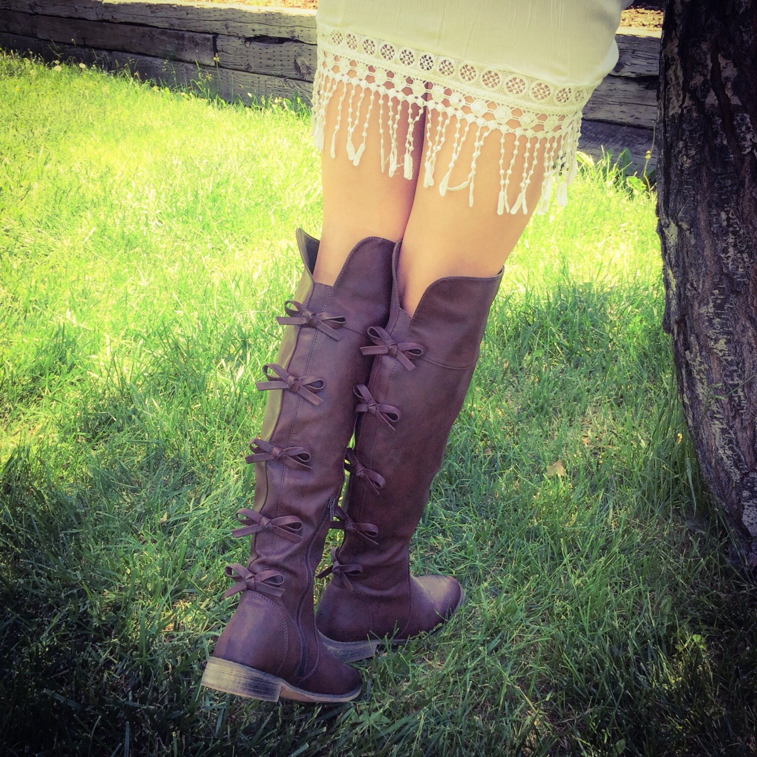 knee high boots with bow on back