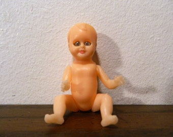 vintage doll with blinking eyes