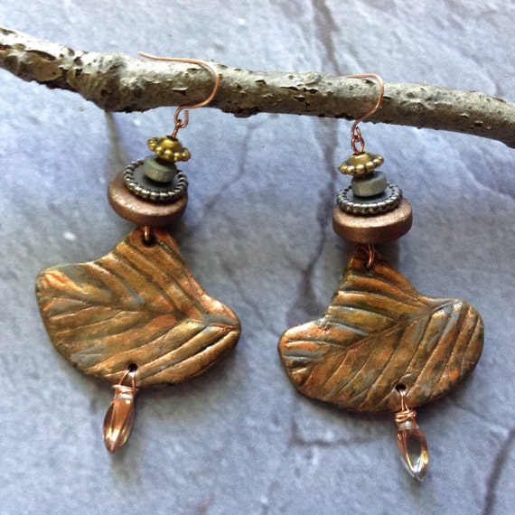 Items similar to Dramatic copper colored drop earrings on Etsy