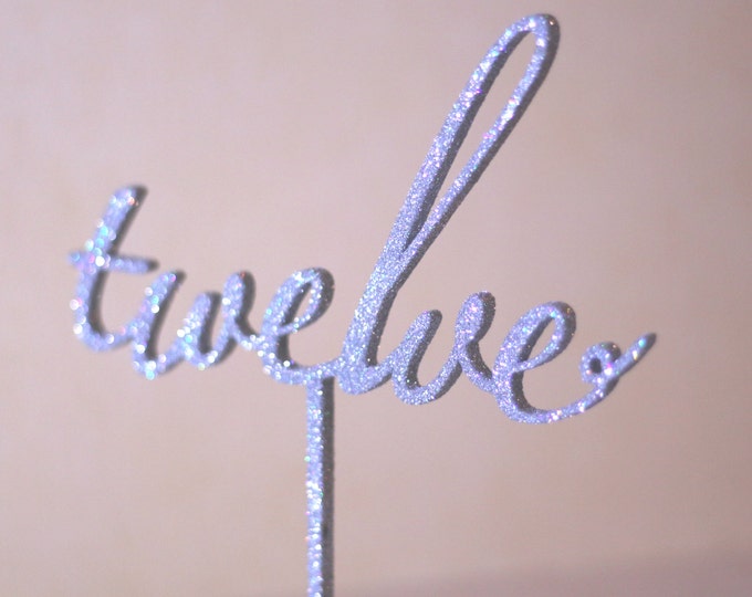 Silver glitter table numbers, with the stick, free standing