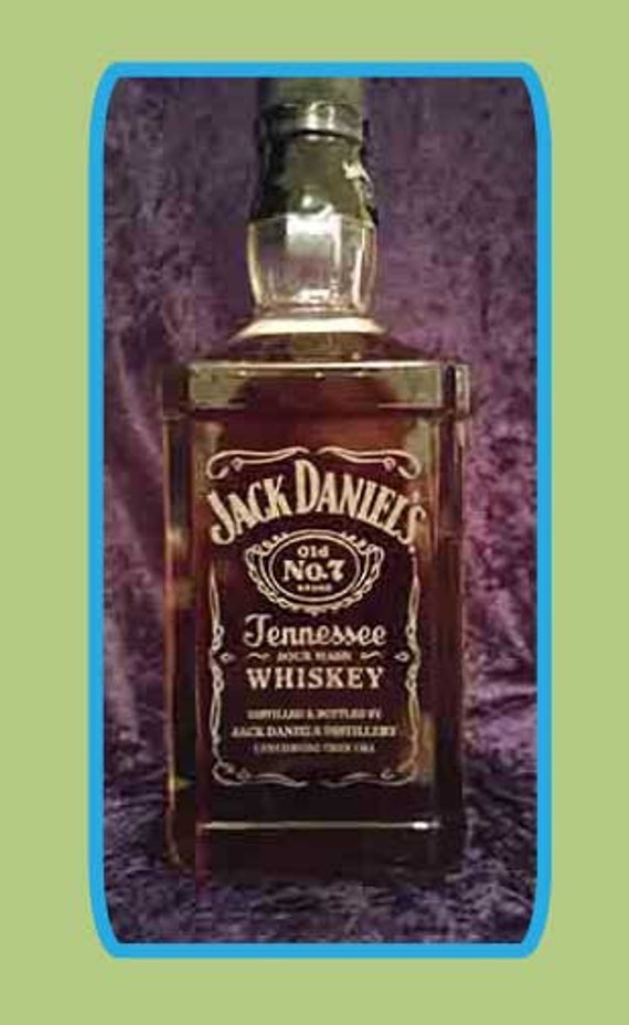 Custom deigned etched Jack Daniels bottles.