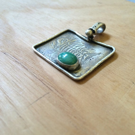 Etched fish skeleton in fine silver with turquoise