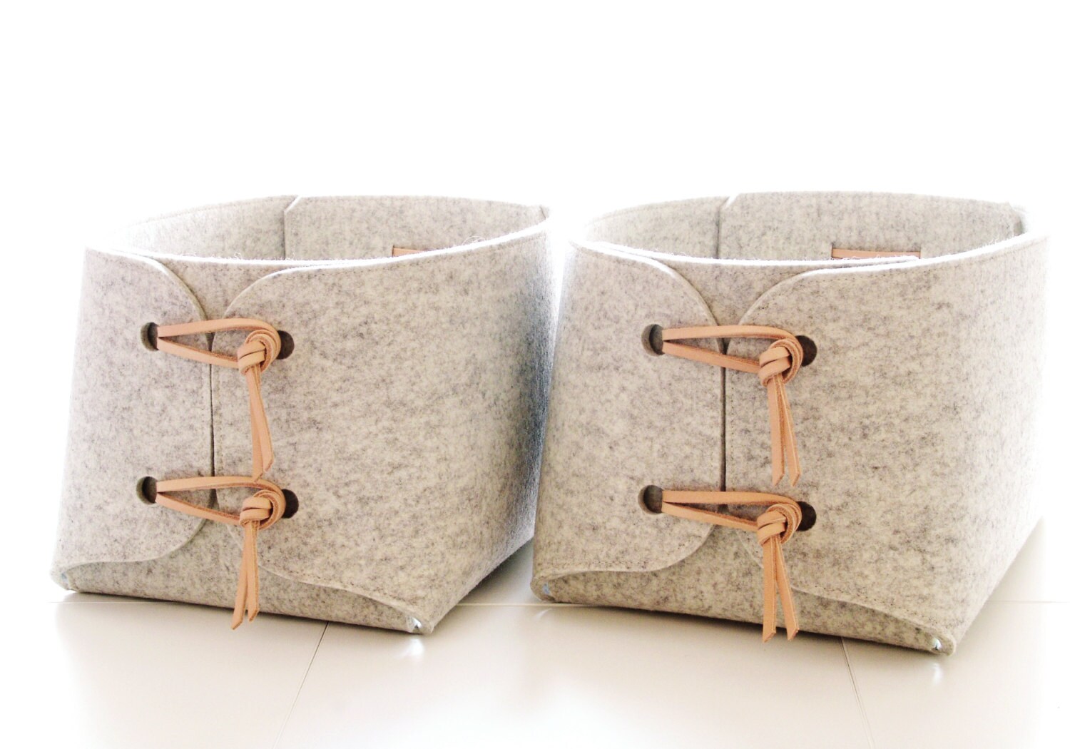 Storage baskets with natural leather details Two by SKANDINAVIOUS