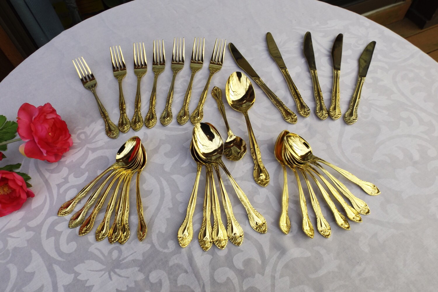 Sale Oriental gold plated stainless set 33 flatware.Vintage