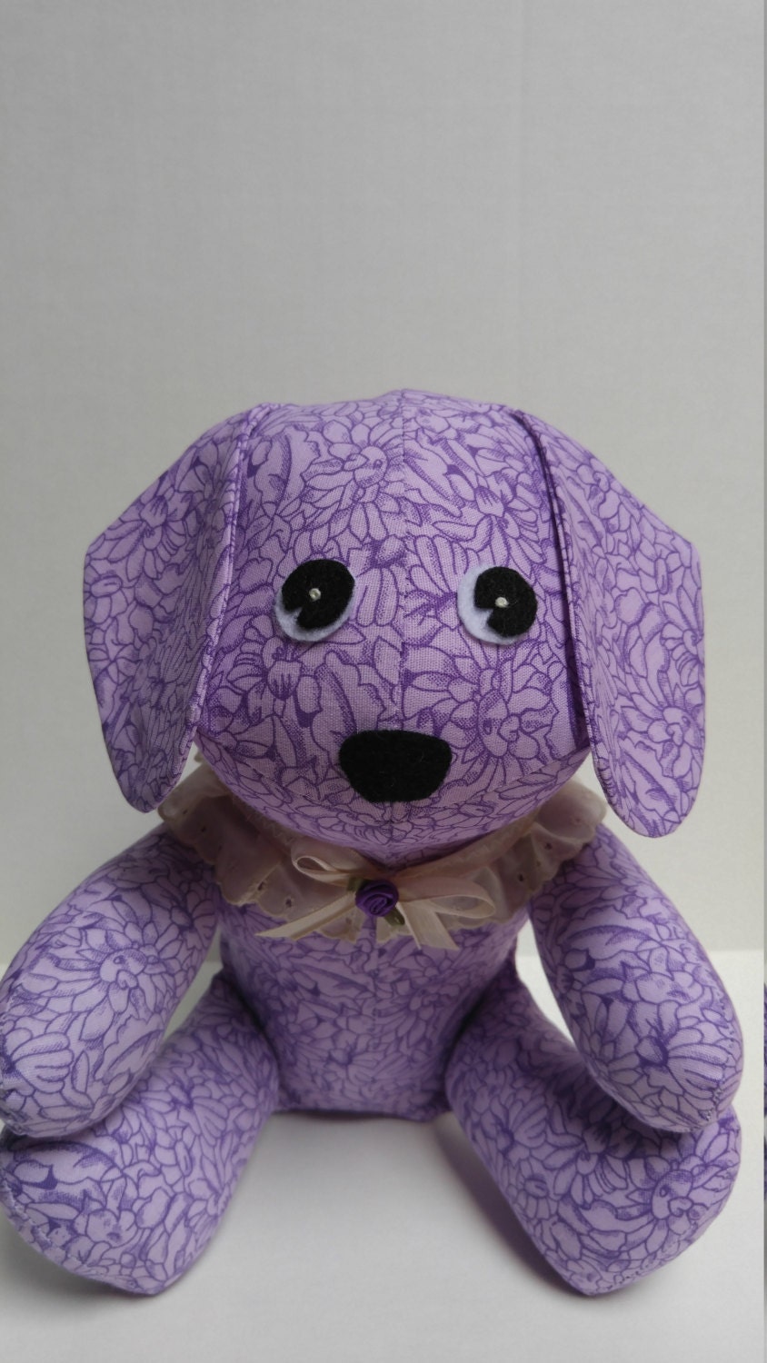 pink and purple stuffed dog