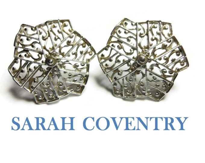 FREE SHIPPING Sarah Coventry clip earrings, 1961 Lady of Spain collection, lacy filigree open work, silver tone snowflake pinwheel statement