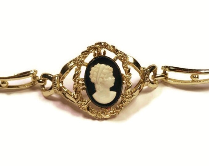 FREE SHIPPING Shved and Cohen cameo bracelet, gold plated featuring a white silhouette on black background, signed S and C vintage