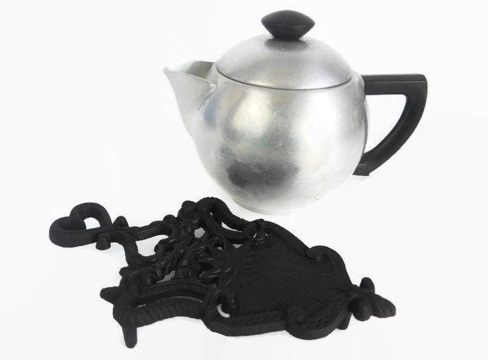 Vintage Black Cast Iron Trivet Sunburst Stamped JZH 1948 Midcentury