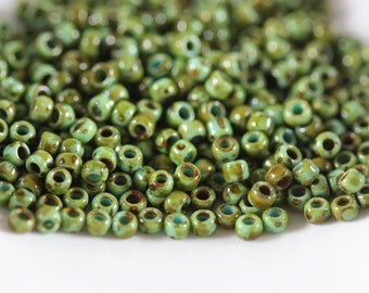 TOHO Seed Bead 11/0 ~ HYBRID Turquoise Picasso 8 Grams (TR-11-Y307) N-26