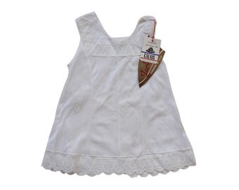 VINTAGE 60's / enfant / fond de robe / lingerie / polyamide blanc + dentelle de Calais / stock ancien neuf / taille 2 ans