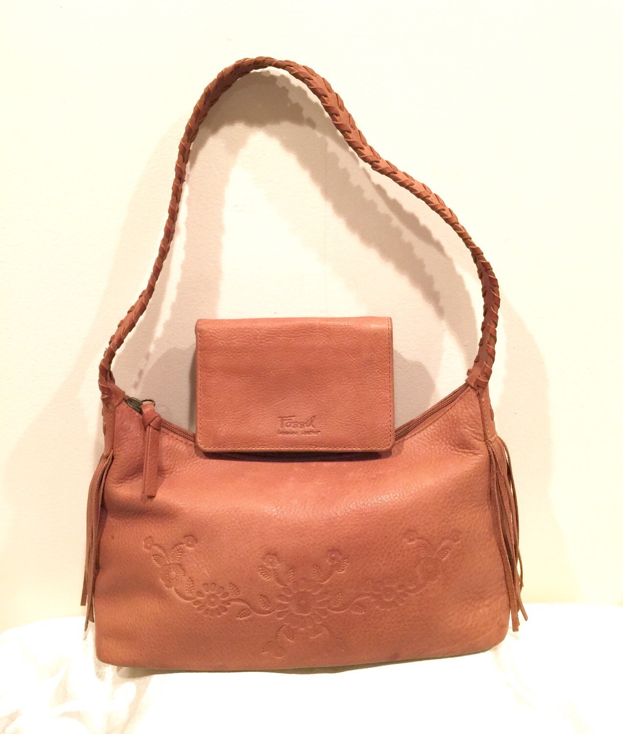 embossed fossil bag