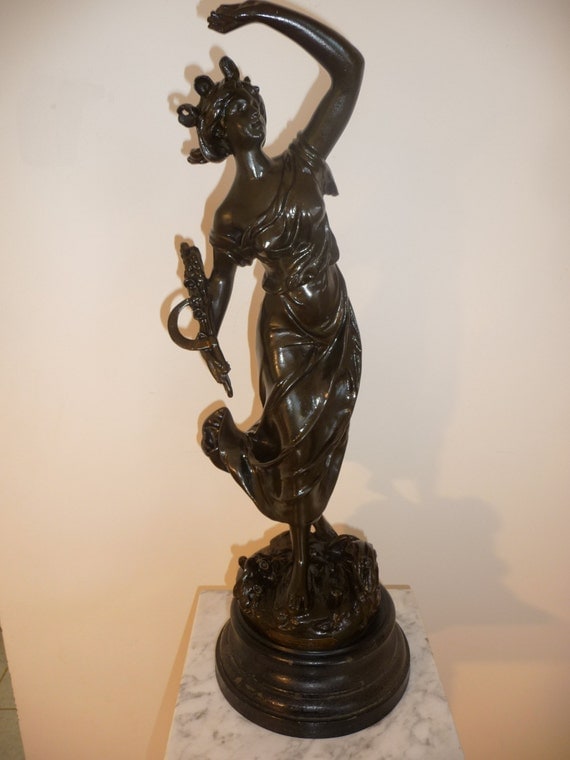 Antique French spelter sculpture LÉclair by Ludot by LaSeigneurie