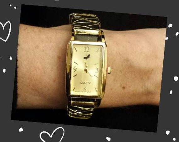 fitbit gold watch