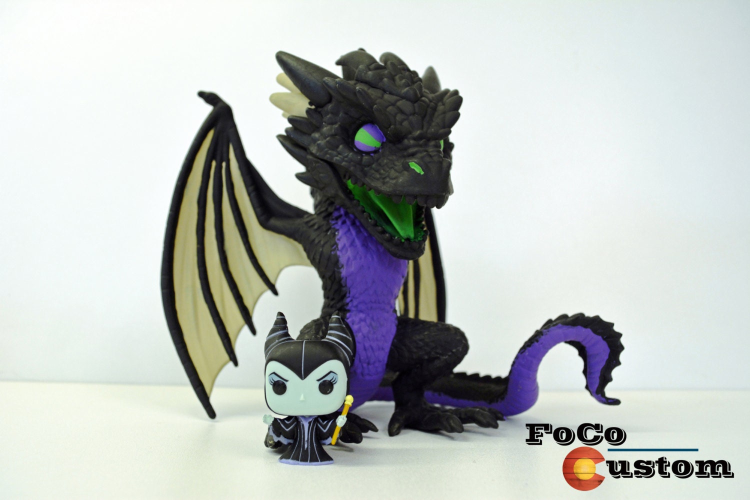 maleficent dragon funko pop glow in the dark