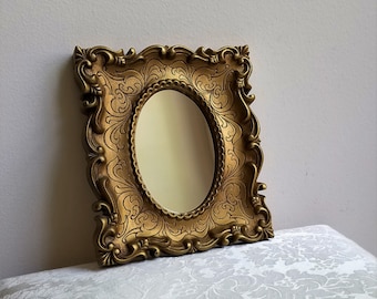 Vintage Ornate Gold Wall Mirror, Faux Carved Wood With Fleur de Lis Flourishes, Hollywood Regency Glam