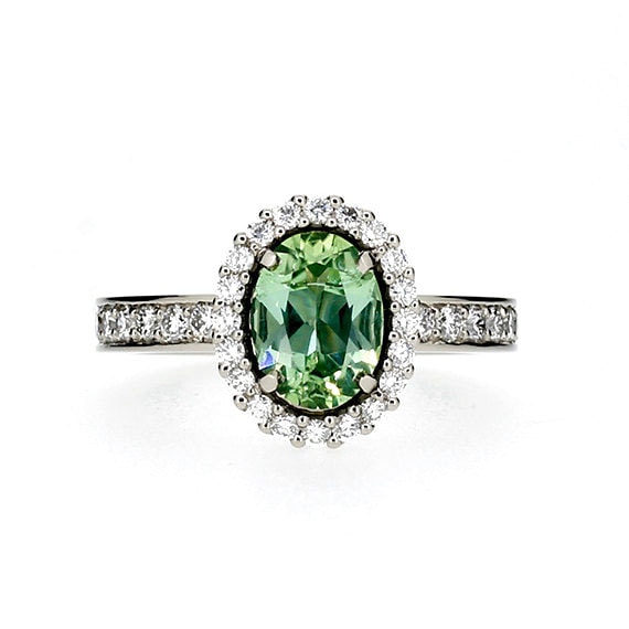 Oval cut Mint green tourmaline halo engagement ring with