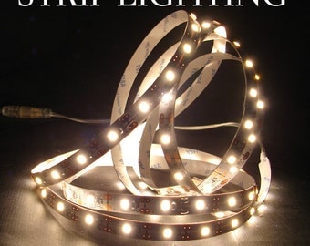 Strip Lighting - Warm White LEDs - battery powered or plug-in options. Includes peel and stick tape to attach lightweight lights anywhere.