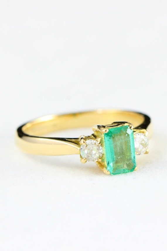 Diamond and emerald engagement ring in 18 carat gold handmade