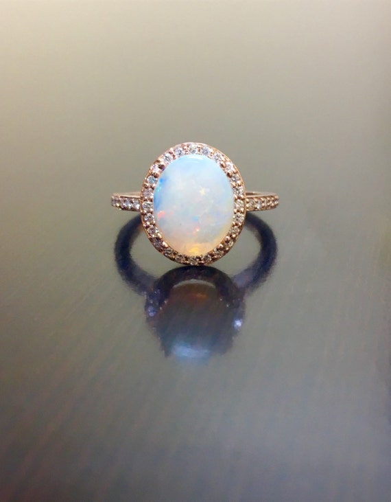 Opal diamond rings 14k