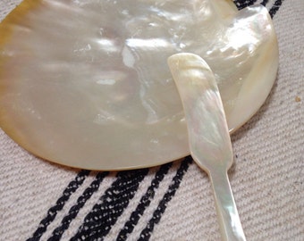 Vintage mother of pearl shell plate and knife