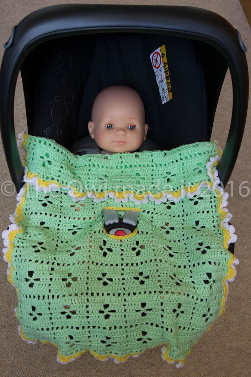 Crochet baby blanket car seat blanket with strap openings