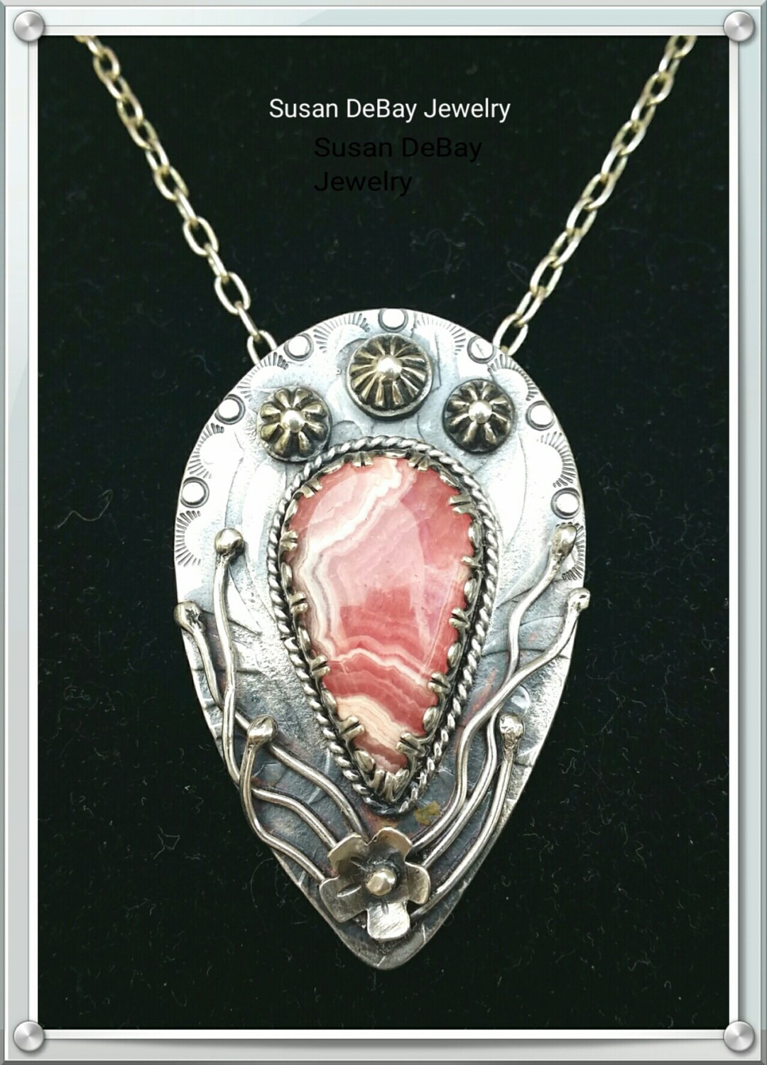 Sterling Silver Pendant with Embellishments and a Pink