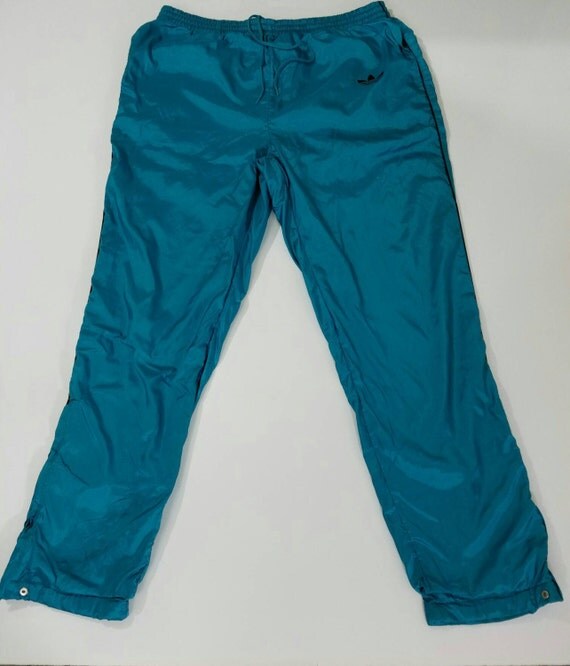 turquoise track pants