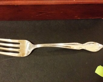 Precious mirror pattern salad fork silver plated by the Wm Rogers company CIRCA 1954