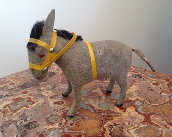 Vintage wind-up flocked burro toy
