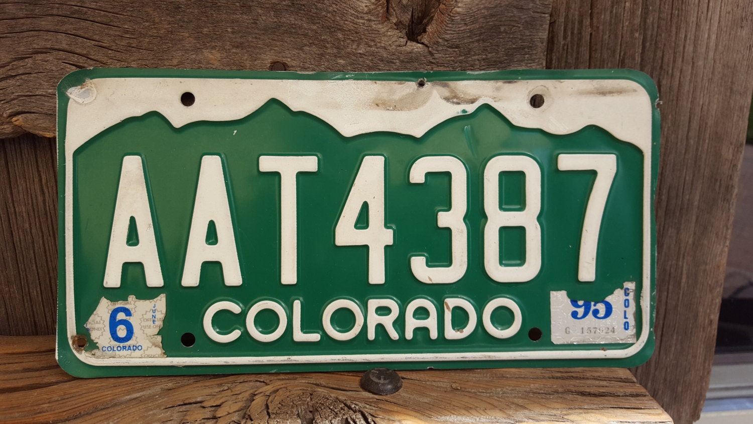 Colorado License Plate Number AAT4387 with June by AmericanAntique