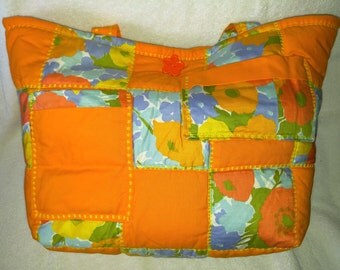 orange padded bag