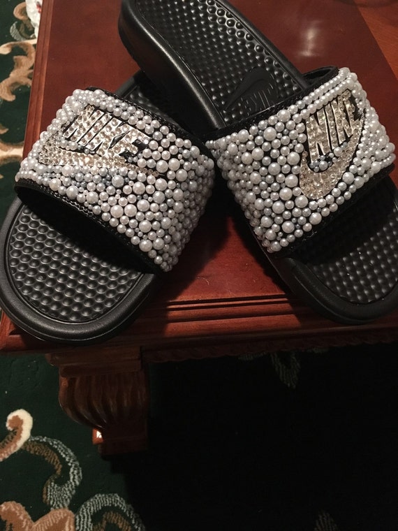 Custom-made bedazzled Nike Slides made with by JaiNicolDesigns