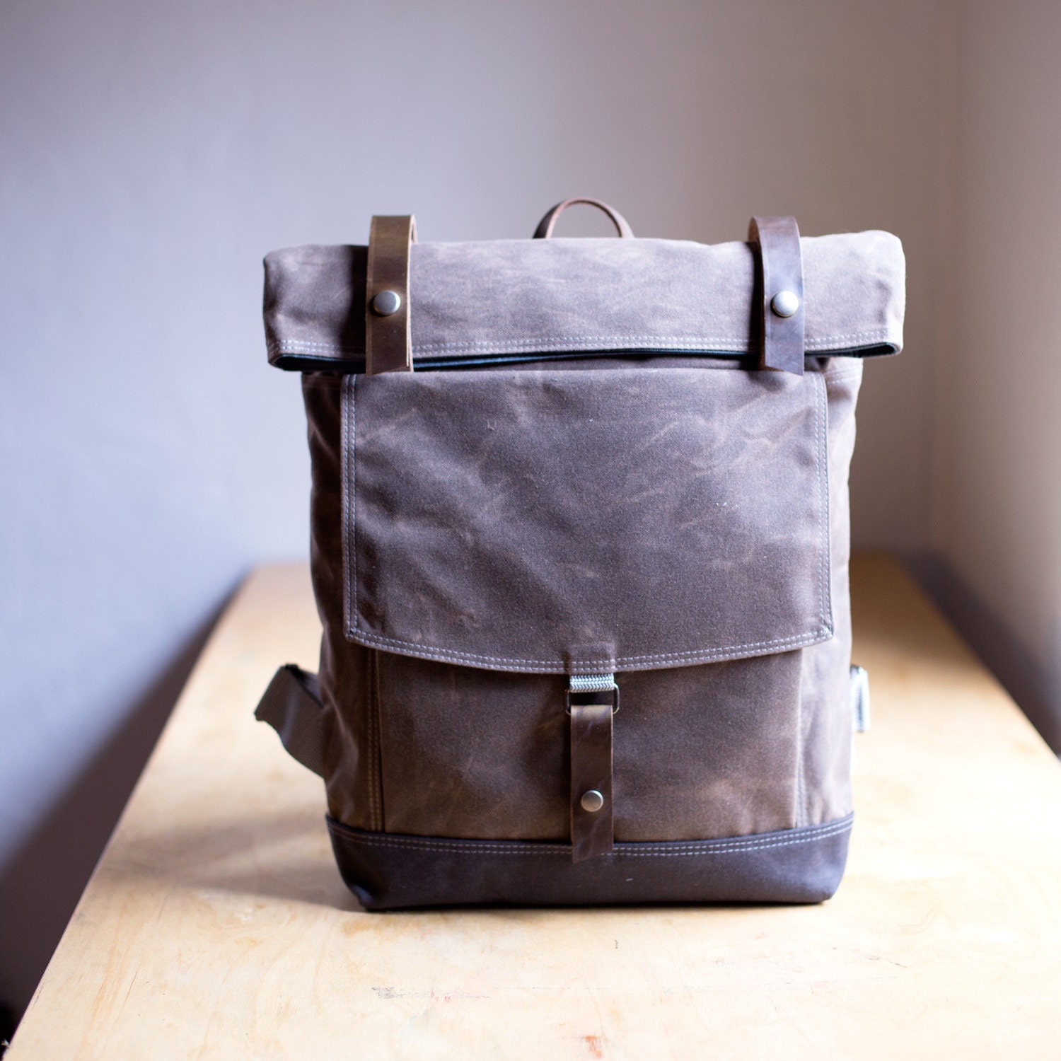 The Backpack in Brown waxed canvas