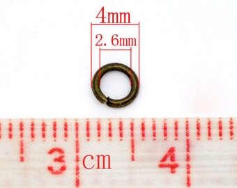100-Pack Silver Plated Open Jump Rings - 4mm Outer Diameter, 20 Gauge (Brass Core)