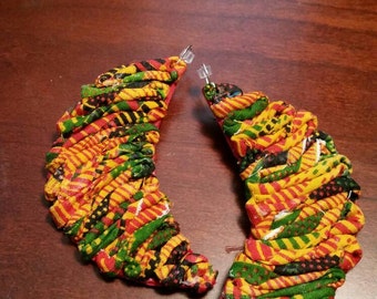Leather kente earrings, moonies.