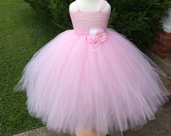 Light pink chic couture flower girl dress perfect for birthdays, photo opps, weddings and much more