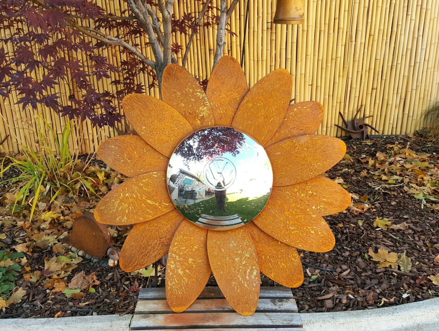 Extra large VW daisy hubcap flower rusted metal wall hanger