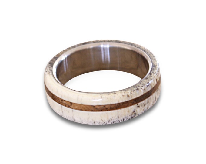 Titanium ring with antler and oak wood inlays off-center
