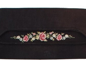 black embroidered clutch bag