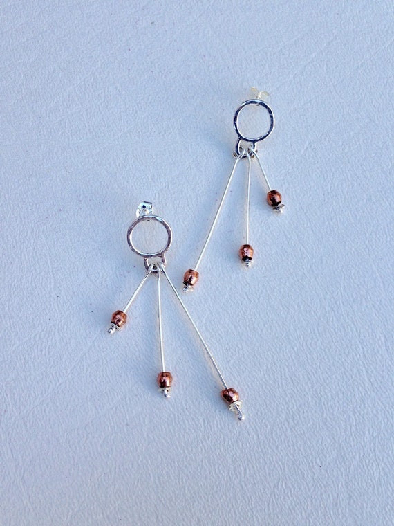 Items similar to Unique handmade earrings using Sterling silver and