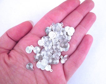 100 Plus 7mm Silver Glue On Bails 10x7mm, A54