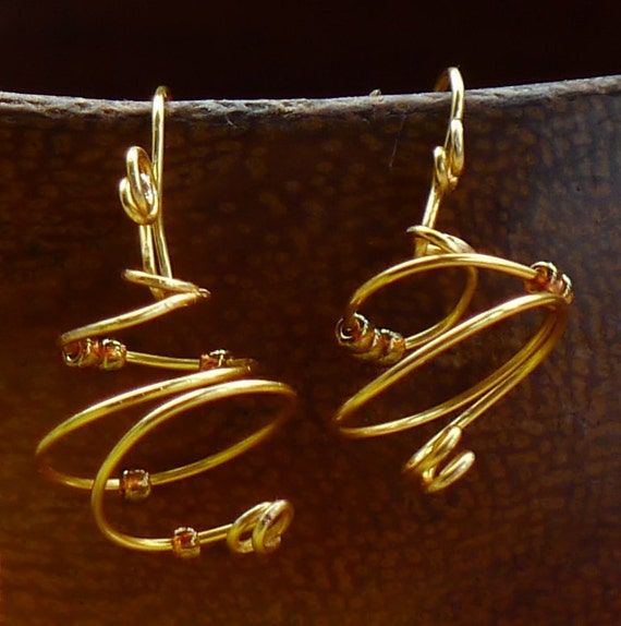 Gold swirl beaded dangling earring by MyDaughterTheJeweler on Etsy