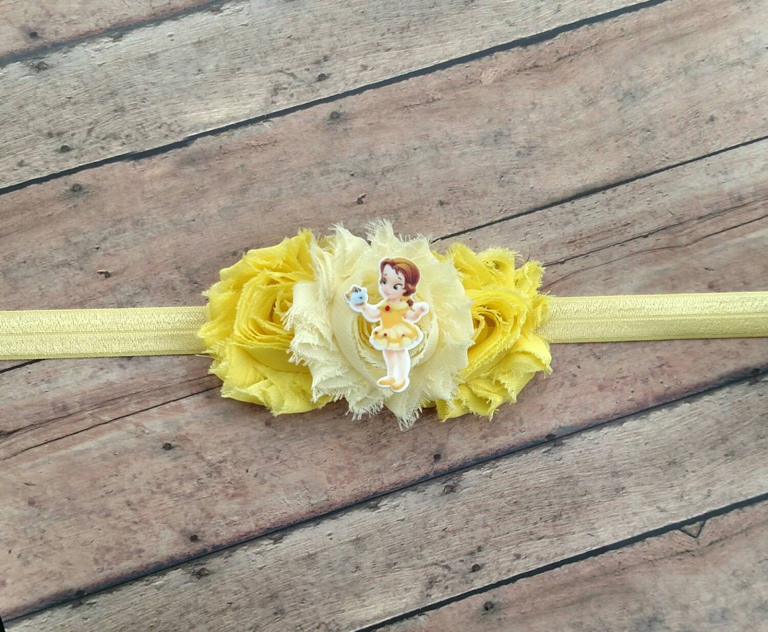 Disney Princess Belle headband with yellow flower on elastic