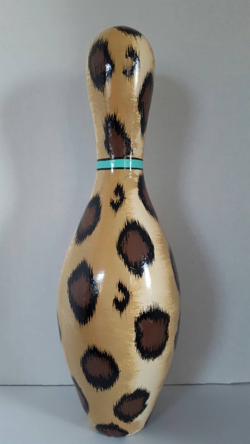 Leopard with teal stripe bowling pin