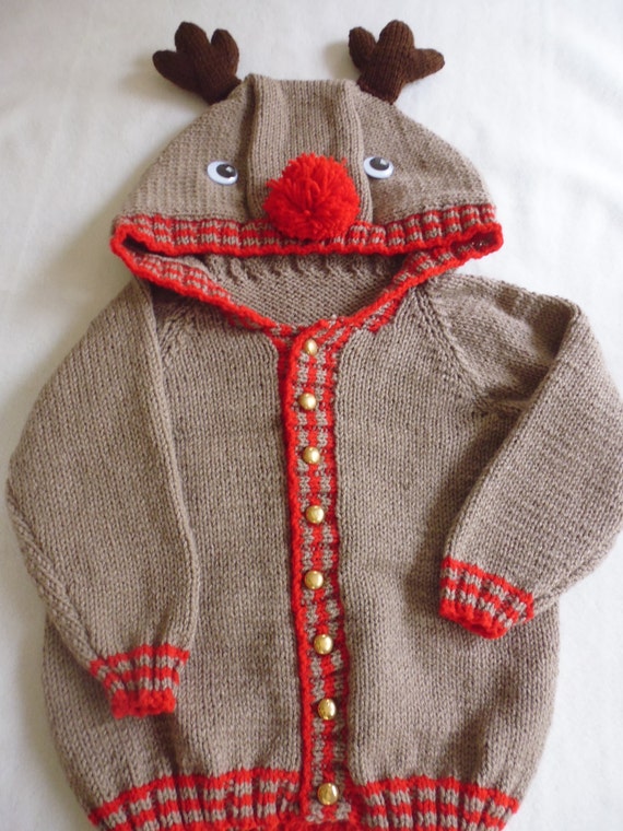 Hand knitted child christmas jumper. 34 years. Reindeer