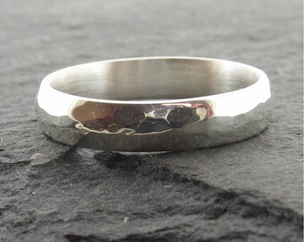 Hammered wedding ring 4mm wide Pebble design in silver