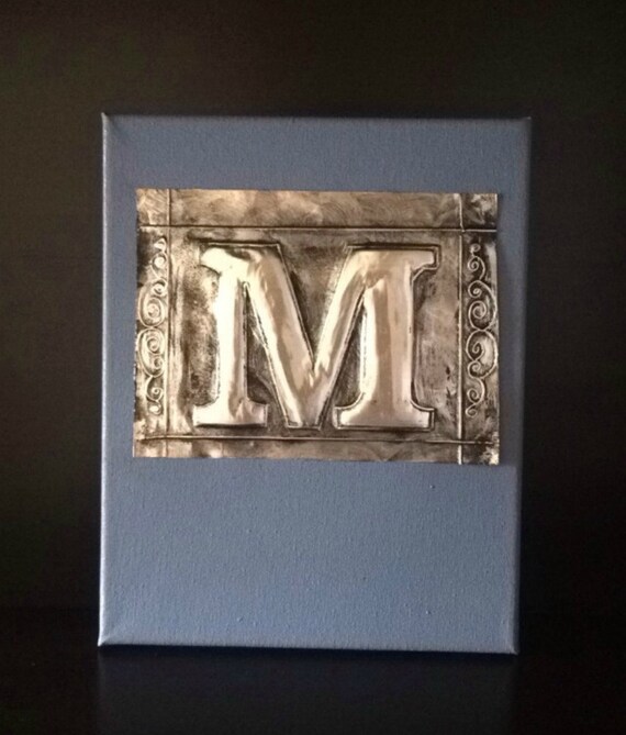 embossed metal letter