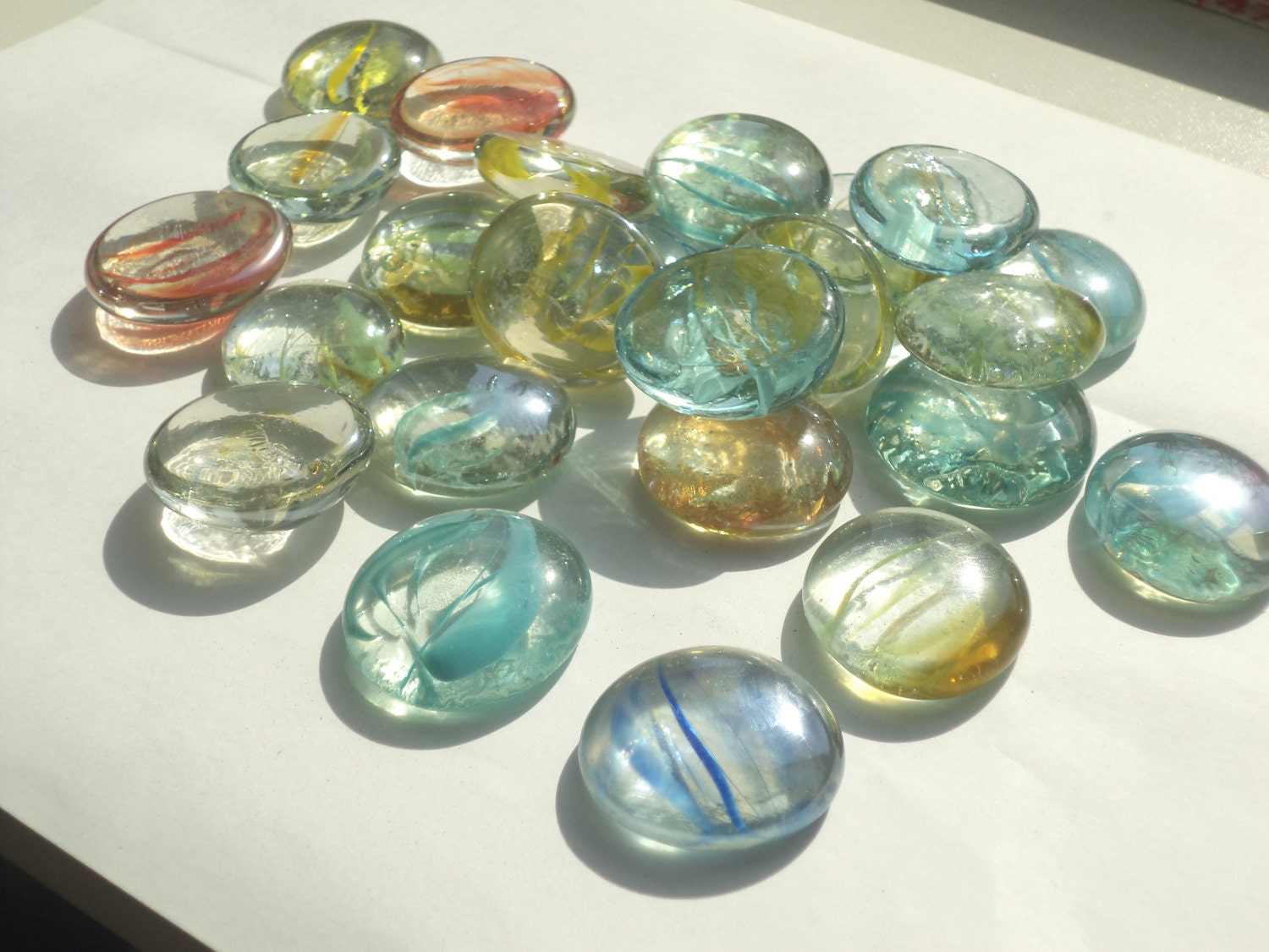Colored glass oval stones for aquarium or home and office